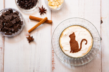 cat mark decorated on cup of hot chocolate