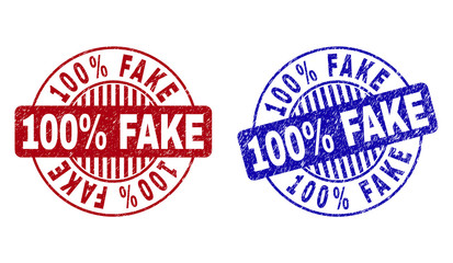 Grunge 100% FAKE round stamp seals isolated on a white background. Round seals with distress texture in red and blue colors. Vector rubber overlay of 100% FAKE text inside circle form with stripes.