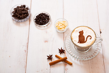 cat mark decorated on cup of hot chocolate