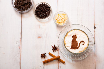 cat mark decorated on cup of hot chocolate