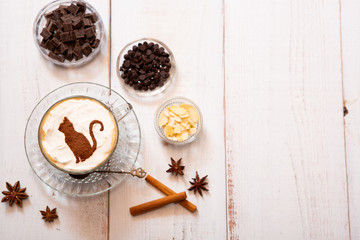 cat mark decorated on cup of hot chocolate