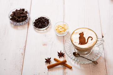 cat mark decorated on cup of hot chocolate