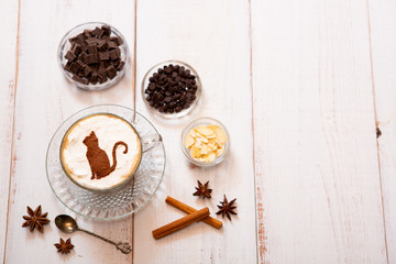 cat mark decorated on cup of hot chocolate