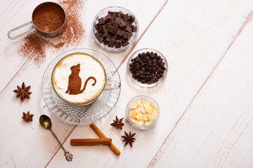 cat mark decorated on cup of hot chocolate