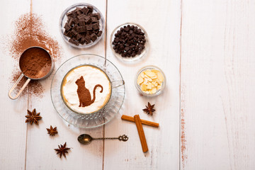 cat mark decorated on cup of hot chocolate