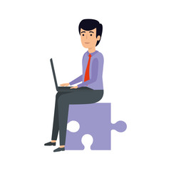 young businessman sitting in puzzle piece