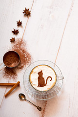 cat mark decorated on cup of hot chocolate