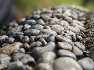 Pebbled stone bench close up