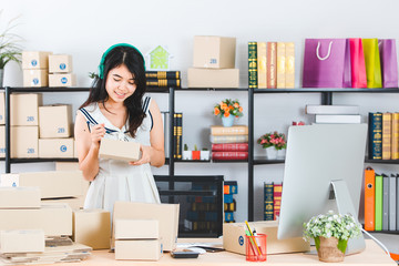 Young Asian business lady at office