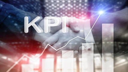 KPI - Key Performance Indicator. Business and technology concept. Multiple exposure, mixed media. Financial concept on blurred background.