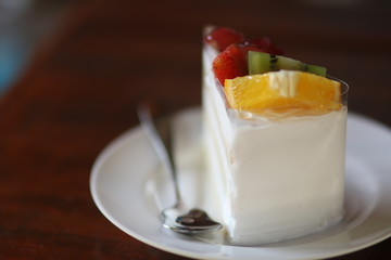 dessert with cream and fruits