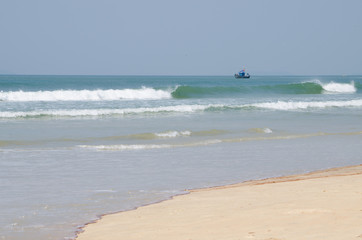 Fototapeta na wymiar beach the Arabian Sea of Goa India with the boat
