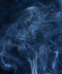 Abstract white smoke on black background