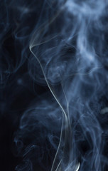 Abstract white smoke on black background