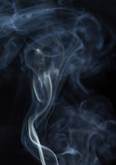 Abstract white smoke on black background
