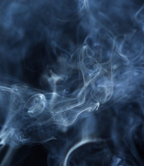 Abstract white smoke on black background