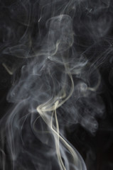 Abstract white smoke on black background