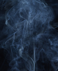 Abstract white smoke on black background