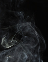 Abstract white smoke on black background