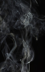 Abstract white smoke on black background