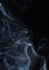 Abstract white smoke on black background