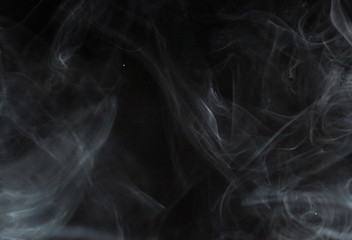 Abstract white smoke on black background