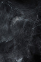 Abstract white smoke on black background