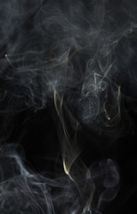 Abstract white smoke on black background