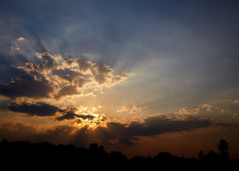 sun rays are striking through the clouds