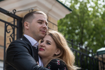 Portrait of young couple in love on the street
