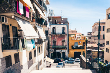 Fototapeta na wymiar beautiful cityscape of Italy, historical street of Catania, Sicily, facade of old buildings.