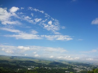 mountains overgrown with green forest north caucasus rocks blue sky sunny summer day nature landscape