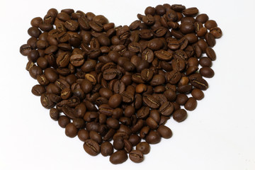 Roasted coffee beans isolated on white background.