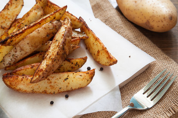Healthy baked potatoes on white paper. Healh and lifestyle concept