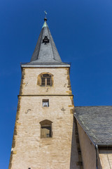 Fototapeta na wymiar Tower of the Stadtkirche church in the historic center of Rheda, Germany