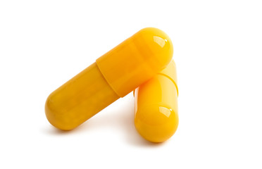 yellow capsules isolated