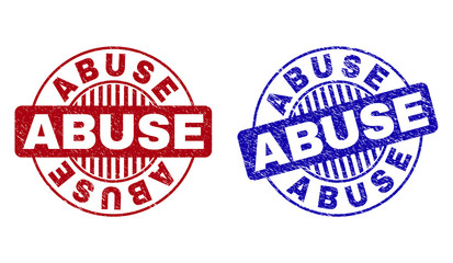 Grunge ABUSE round stamp seals isolated on a white background. Round seals with grunge texture in red and blue colors. Vector rubber watermark of ABUSE title inside circle form with stripes.