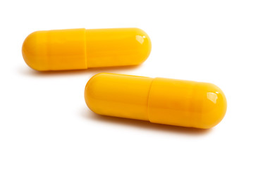 yellow capsules isolated