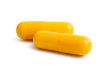 yellow capsules isolated