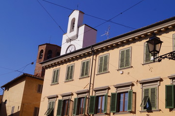Fototapeta na wymiar Clock Tower and Hexagonal bell tower of San Lorenzo church , Borgo San Lorenzo, Tuscany, Italy
