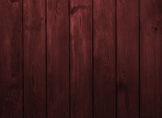 Old dark red wooden wall, detailed background photo texture.