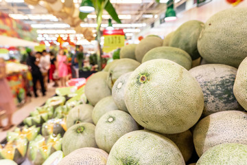 Close up many melons. Summer tray market agriculture farm full of organic fruits. Healthy eating.