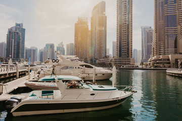 Fototapeta na wymiar January 02, 2019 . Panoramic view with modern skyscrapers and water pier of Dubai Marina , United Arab Emirates