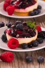 Cheesecakes with mixed berries.