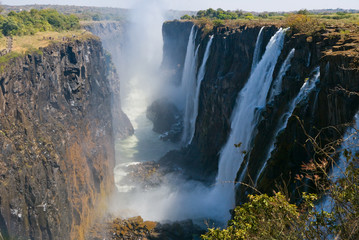Fototapeta na wymiar View of Victoria Falls from the ground. Mosi-oa-Tunya National park. and World Heritage Site. Africa. Zambiya. Zimbabwe.
