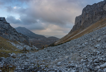 landscape,mountain,sky,nature,view,blue,travel,hiking,beautiful,peak,summer,green,rock,outdoor,scenery,forest,tourism,cloud,mountains,high,natural,background,alpine,alps,scenic