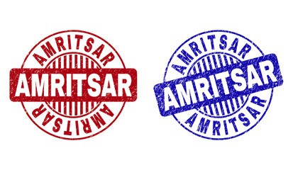Grunge AMRITSAR round stamp seals isolated on a white background. Round seals with grunge texture in red and blue colors. Vector rubber overlay of AMRITSAR label inside circle form with stripes.