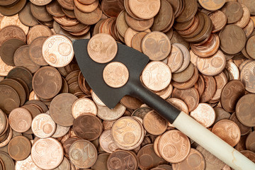 Shovel with coins