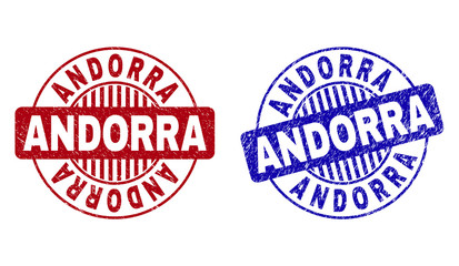 Grunge ANDORRA round stamp seals isolated on a white background. Round seals with grunge texture in red and blue colors. Vector rubber watermark of ANDORRA title inside circle form with stripes.