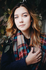 Portrait of a beautiful young women in autumn.